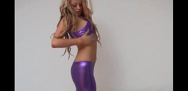  Leigh teasing in tight purple spandex panties